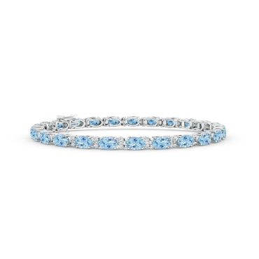 Classic Oval Aquamarine and Diamond Tennis 14 KT White Gold Bracelet